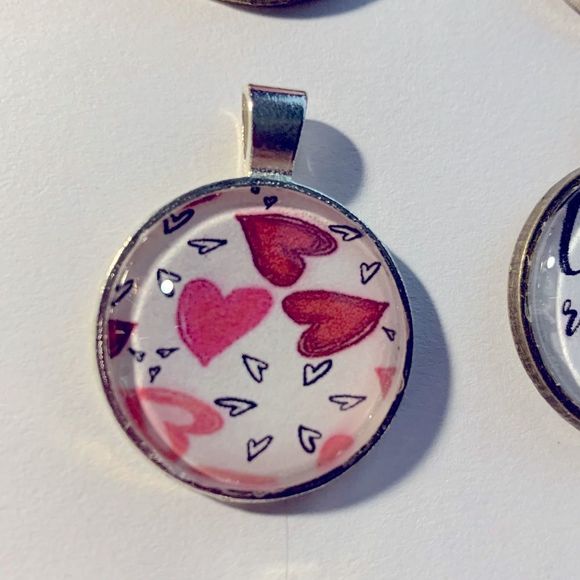 My heart is all aflutter! Silvertone pendant with vegan leather cord - Picture 2 of 2